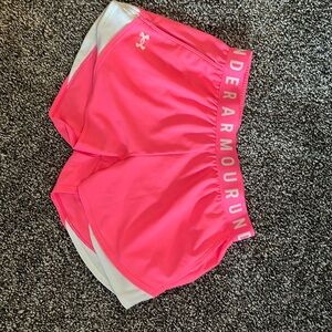pink, under armour, running shorts, size small. Only worn once.